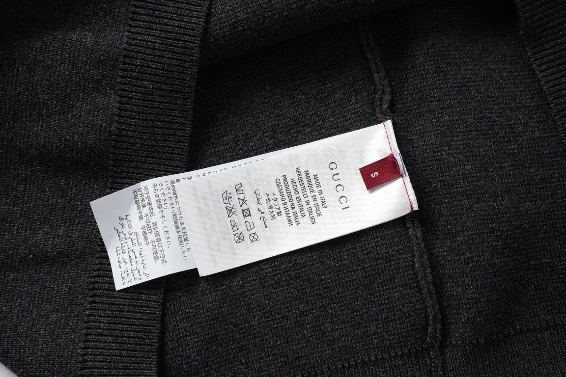 Gucci T-Shirt Without Collar 'Black' featuring a minimalist design with the iconic Gucci logo, crafted from premium cotton for a comfortable fit, perfect for casual outfits.