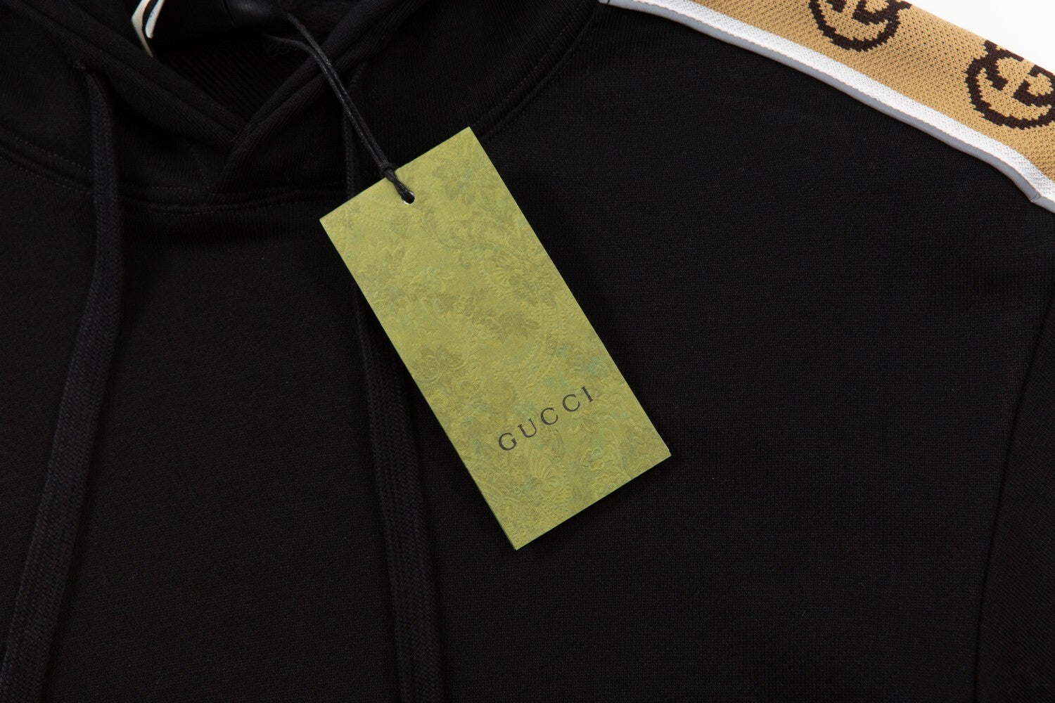 Gucci Cotton Jersey Hooded Sweatshirt model wearing it outdoors.