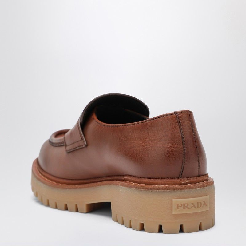 PRADA Men's Leather Loafers with Enamelled Metal Logo Strap - Banlieue91 -