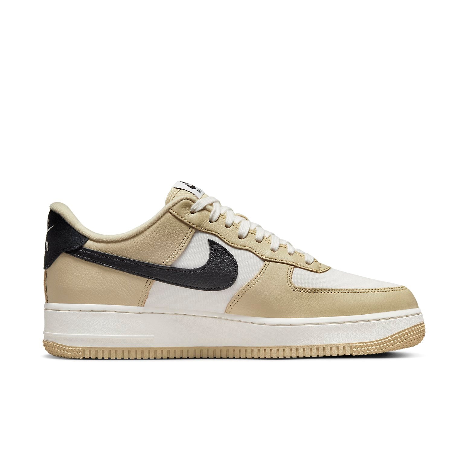 Close-up view of Nike Air Force 1 Low 07 'Team Gold Black' highlighting the detailed textures and black accents.