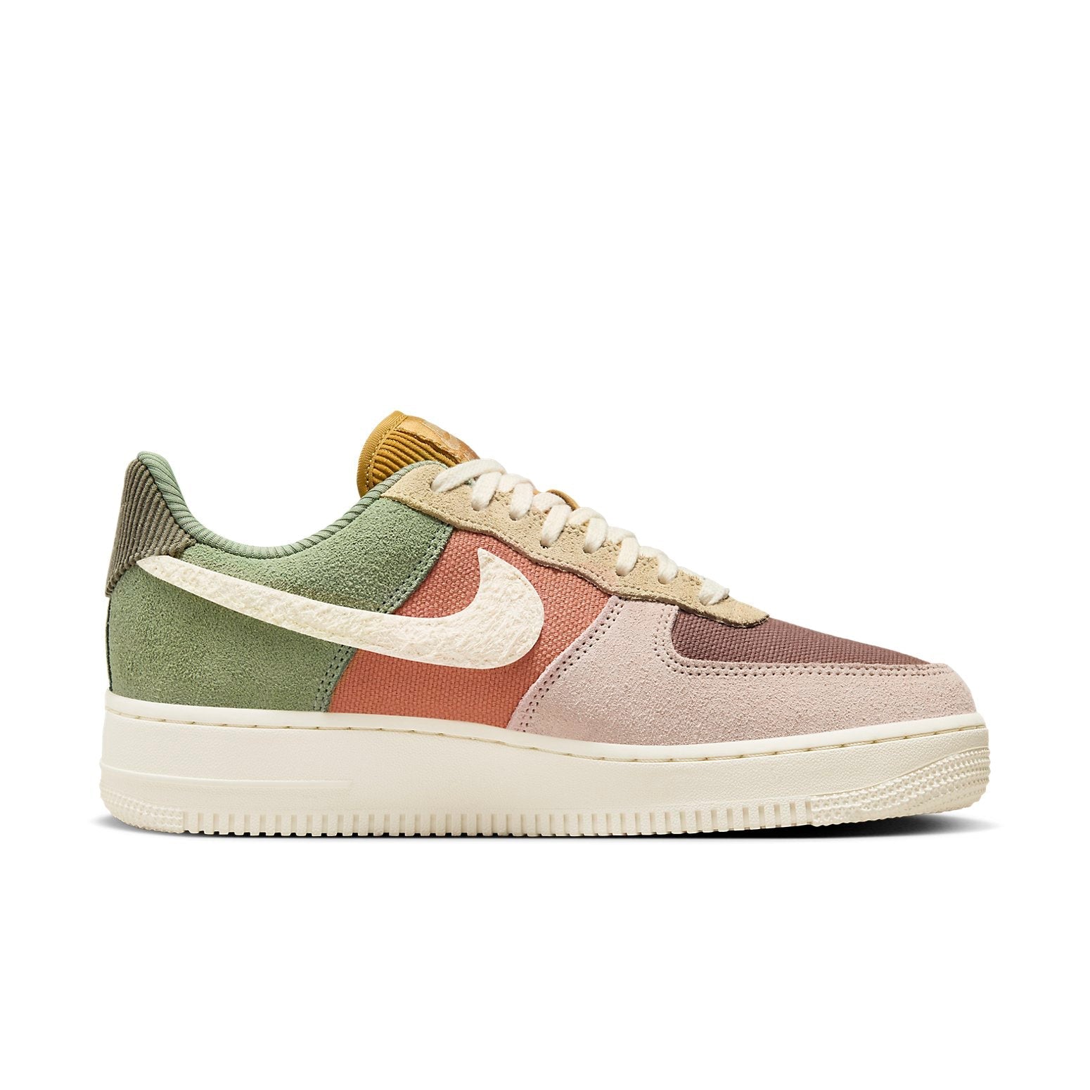 Close-up view of Nike Air Force 1 '07 LX 'Oil Green Terra Blush', highlighting the suede overlays and contrasting Pale Ivory Swoosh logo.