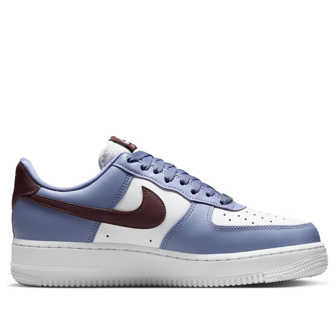 Close-up of Nike Air Force 1 Low 'Diffused Blue', highlighting the unique texture and color details in the footwear.