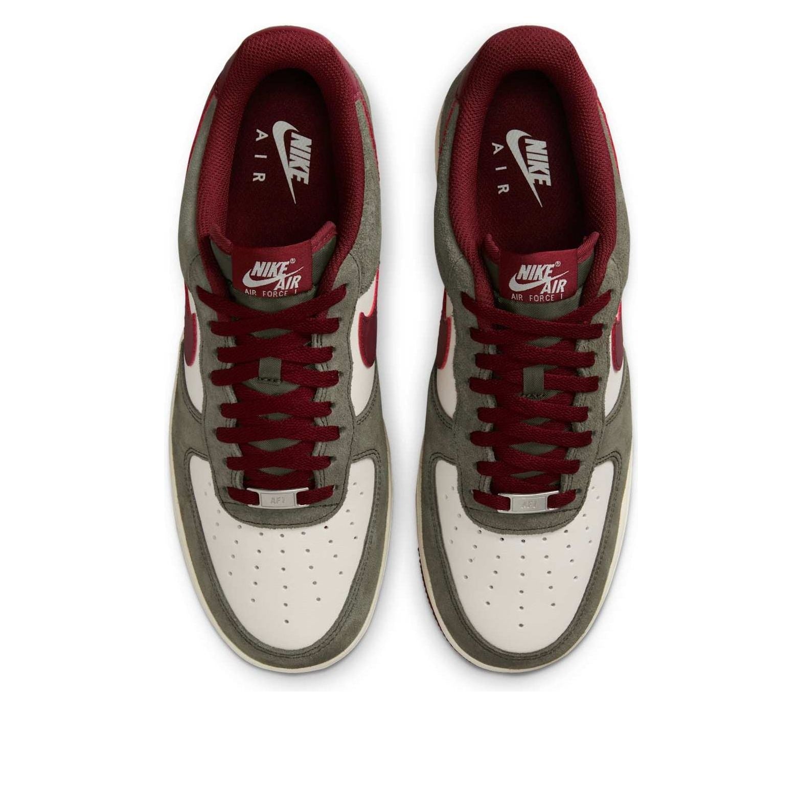 Lifestyle shot of Nike Air Force 1 Low '07 LV8 'Cargo Khaki Pale Ivory Dark Team Red' worn in casual outfit.