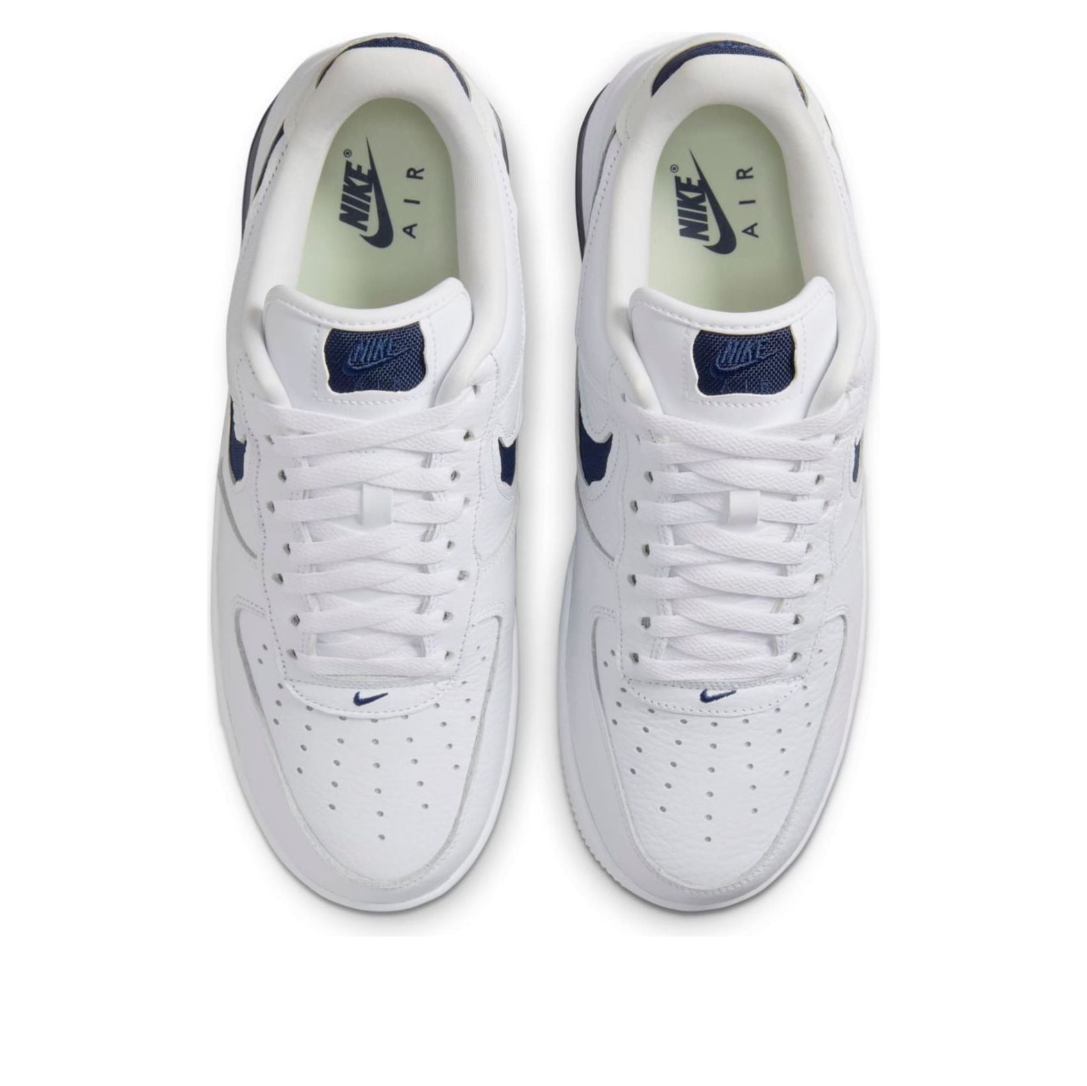 Nike Air Force 1 Low Evo 'White Midnight Navy' sneakers in a stylish display showcasing their classic white and navy colorway.