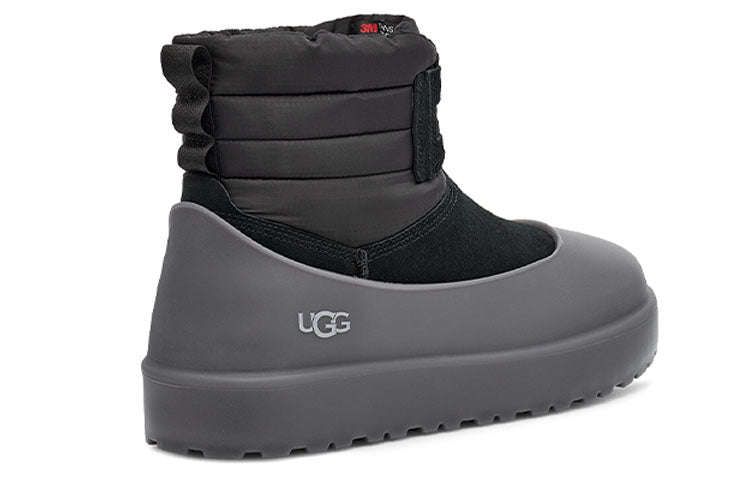 Side view of the UGG Classic Mini Lace-Up Weather Boot in Black, perfect for winter outfits.