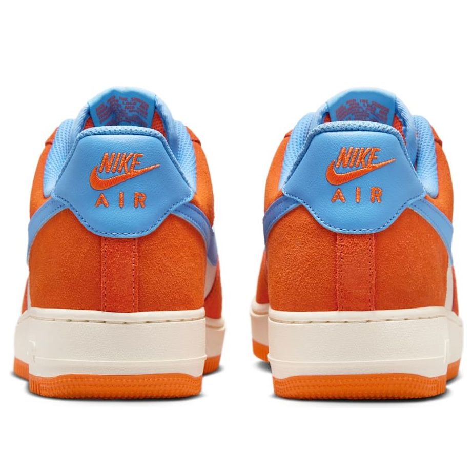 Air Force 1 Low 'Safety Orange Light Blue' displayed against a clean backdrop, emphasizing the unique colorway.