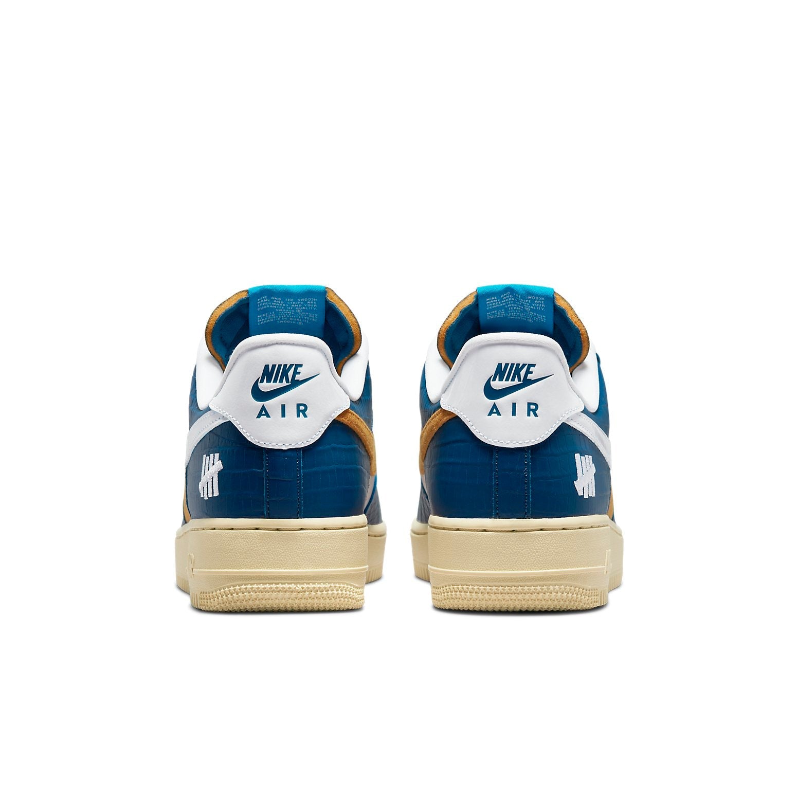 Side view of the Nike x Undefeated Air Force 1 Low SP 'Dunk vs AF1' highlighting the perforated canvas and iconic silhouette.