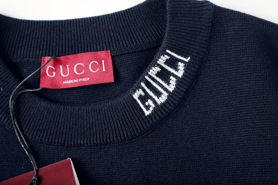 Lifestyle image of Gucci T-Shirt Without Collar 'Black' styled with jeans and a jacket, representing effortless sophistication.