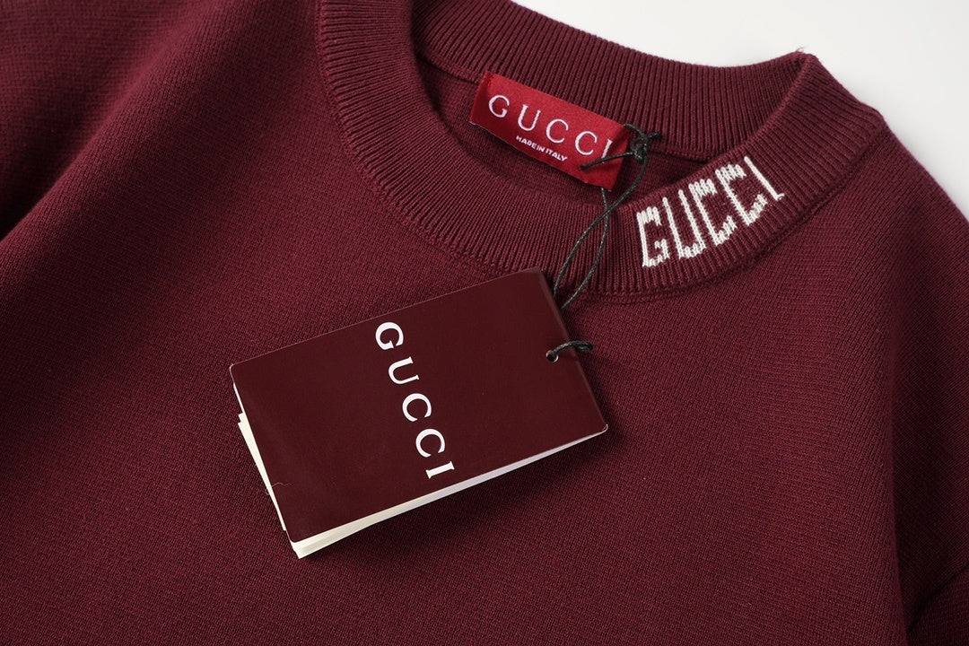 Model wearing the Gucci T-Shirt Without Collar 'Black', styled casually with jeans for an effortless, trendy look.