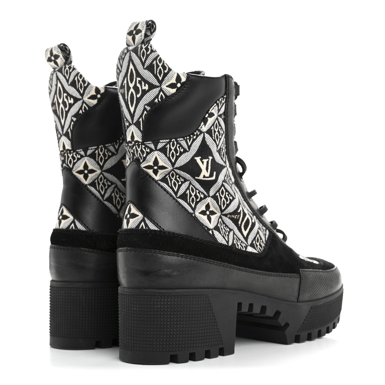 Side view of Louis Vuitton Laureate Platform Desert Boots highlighting the treaded platform outsole and long leather laces.