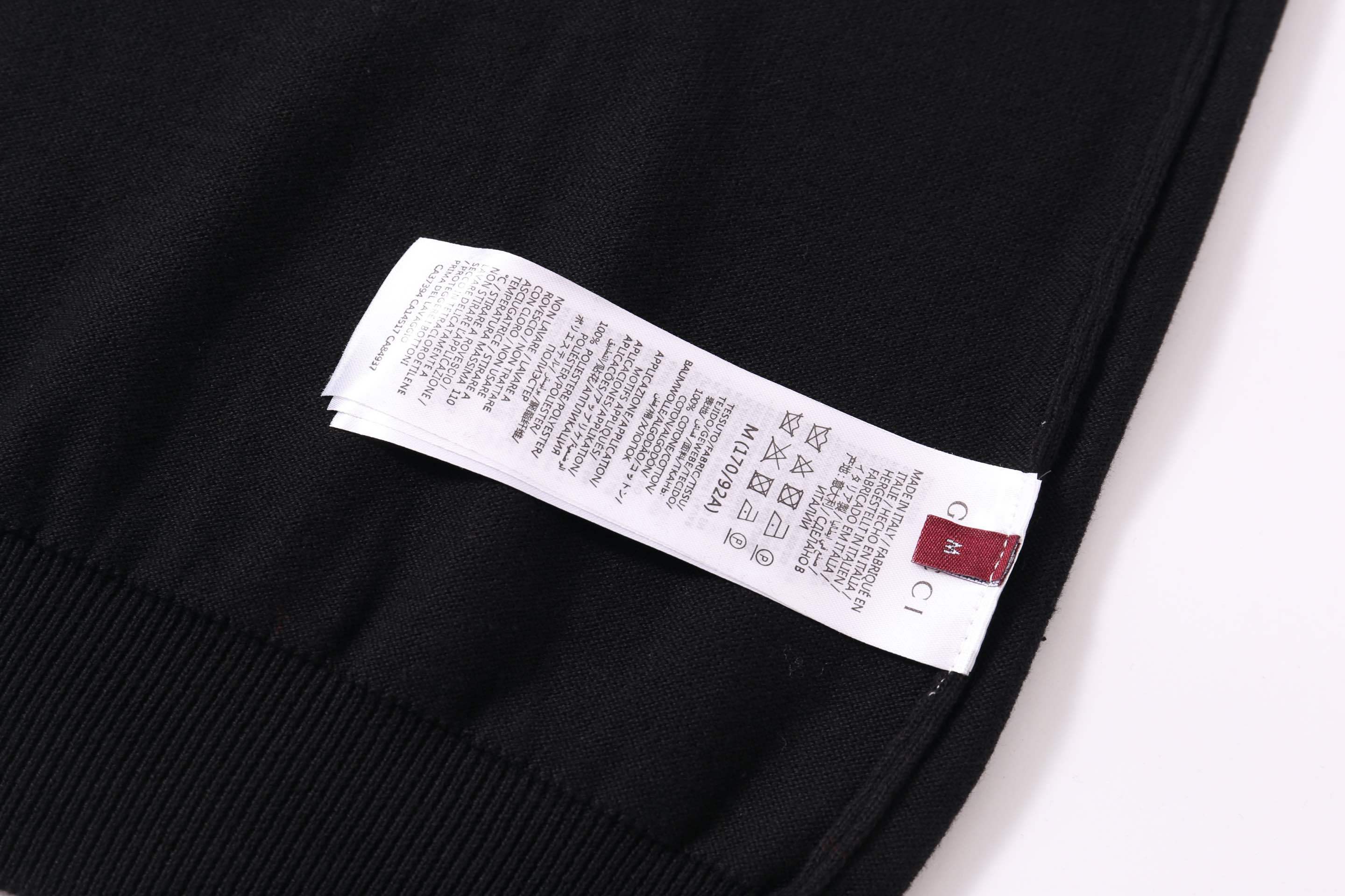 Gucci T-shirt with a collar, showcasing a stylish blend of casual luxury fashion, made from premium cotton and featuring a sleek collar design.