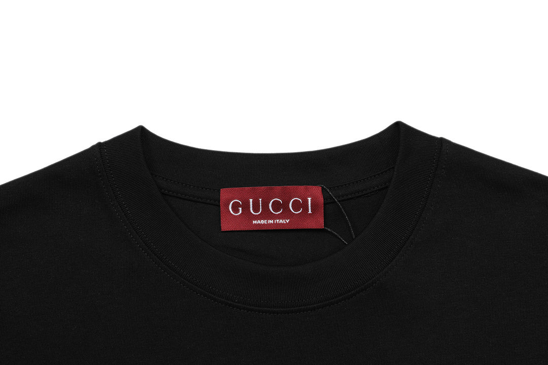 Gucci T-Shirt Without Collar 'Black' displayed on a model, showcasing the minimalist design and iconic Gucci logo.