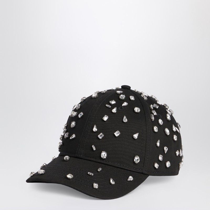 Black baseball cap with sparkling crystal embellishments, fashion accessory on white background
