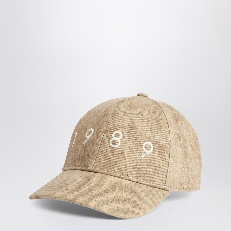 Beige baseball cap with white 1989 embroidery on front, casual streetwear accessory
