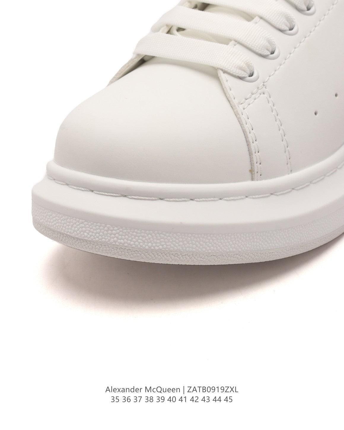 Alexander McQueen Sneakers White & Red | Luxury Fashion Statement | Banlieue91