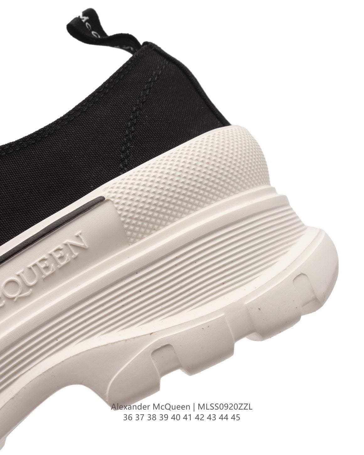 Alexander McQueen Women Tread Slick lace-up Sneakers 'Black/White' | Banlieue91