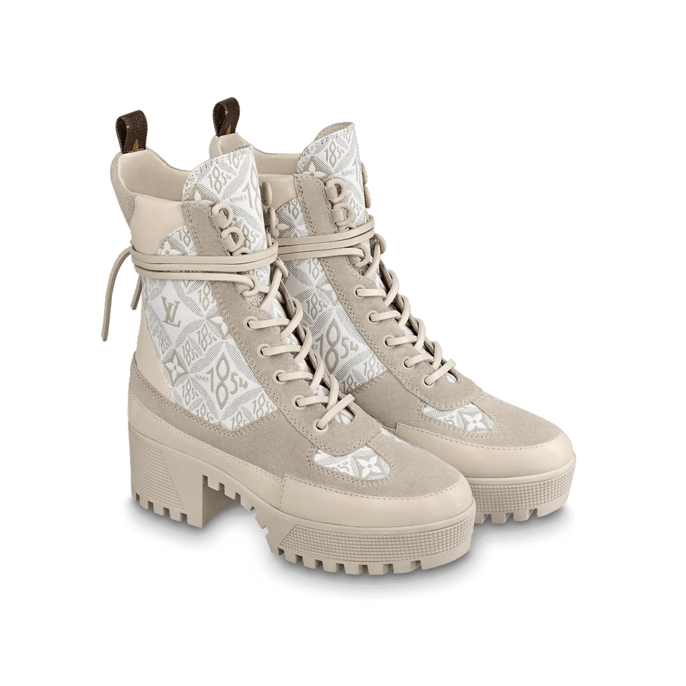 Stylish Louis Vuitton Laureate Platform Desert Boots featuring a treaded platform outsole and long leather laces with Monogram canvas back loop.