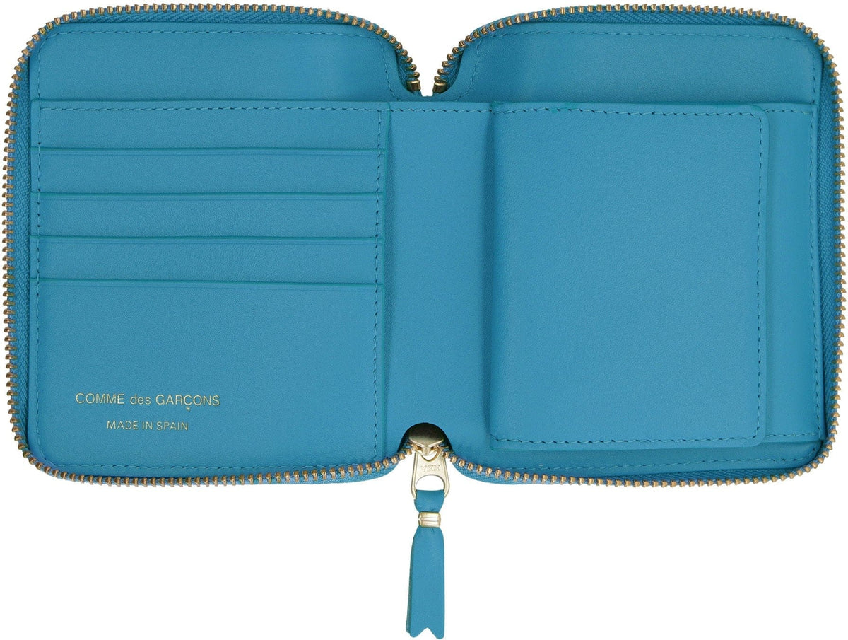 COMME DES GARÇONS WALLET Mini Vertical Zip Around Wallet | Banlieue91