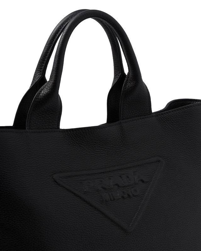 Prada logo-embossed leather tote bag - Banlieue91
