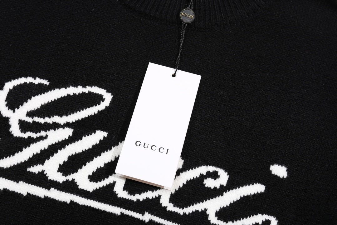 Model wearing Gucci Logo Crew-Neck Sweater in navy, standing 6 feet 1 inch tall, displaying the stylish long sleeves and comfortable fit ideal for everyday wear.