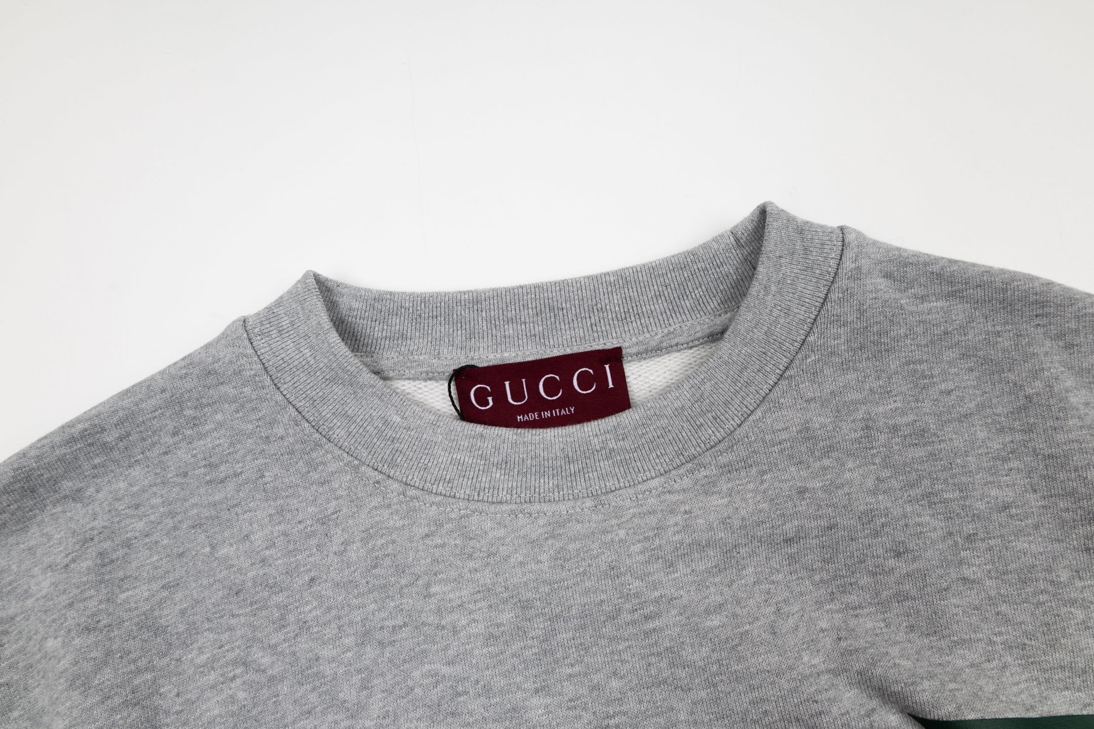 GUCCI Gray Cotton Jersey Sweatshirt New & Authentic worn by a model, highlighting its fit and versatility.