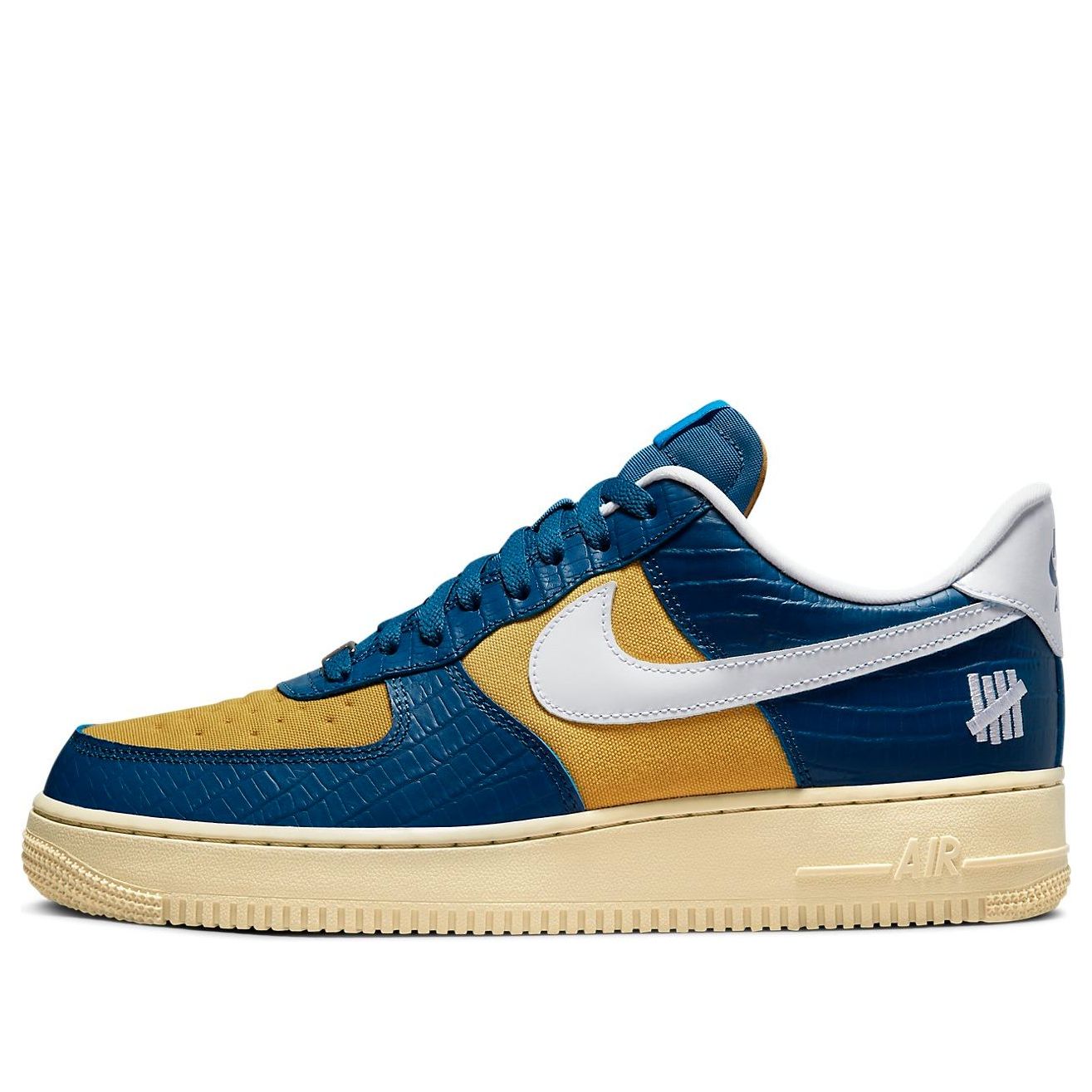 Nike x Undefeated Air Force 1 Low SP 'Dunk vs AF1' showcasing vibrant blue and yellow color scheme with crocodile skin pattern.