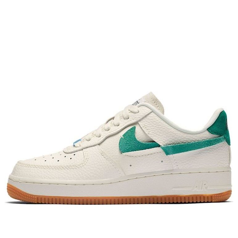 Nike Air Force 1 Vandalized 'Green' sneaker angle view showcasing the sail, mystic green, and sky blue colorway with unique lateral Swoosh design.