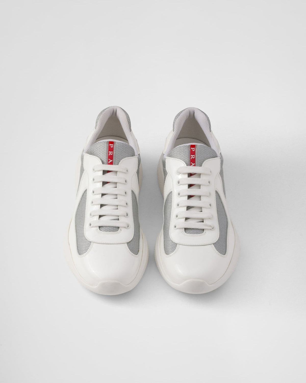 Patent leather and technical fabric Prada America's Cup sneakers 'Grey' | Banlieue91