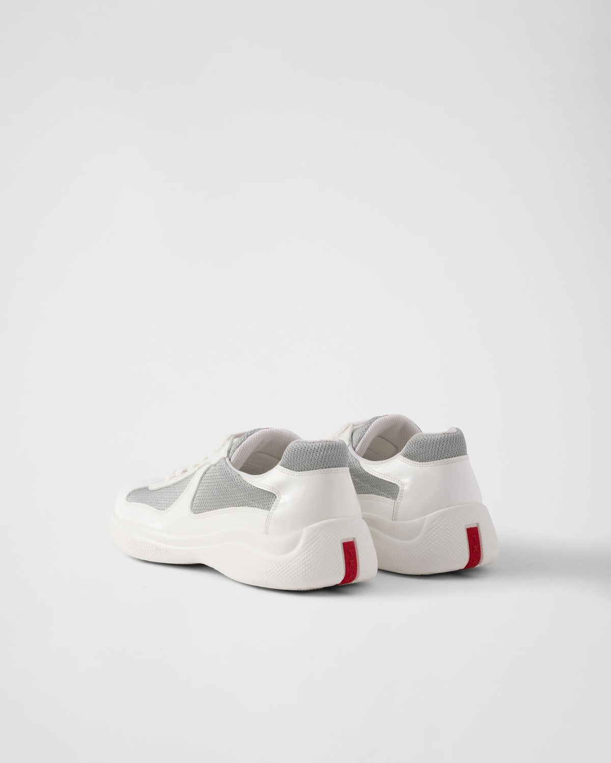 Patent leather and technical fabric Prada America's Cup sneakers 'Grey' | Banlieue91