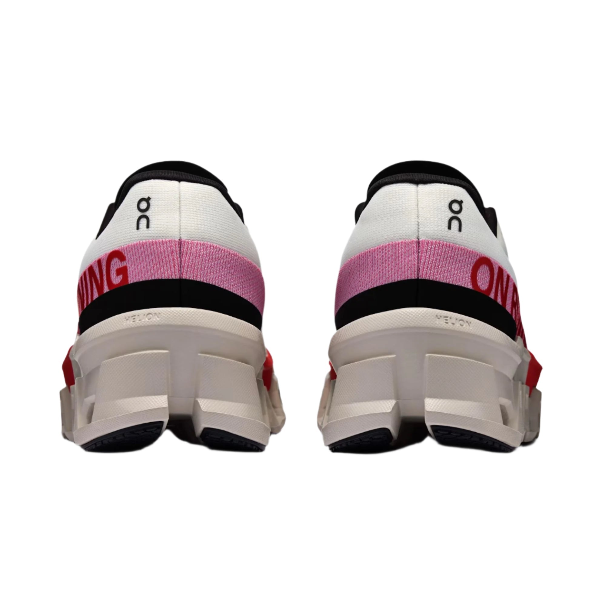 White, pink, and black fashion sneakers with bold red lettering and chunky soles, ideal for streetwear style.