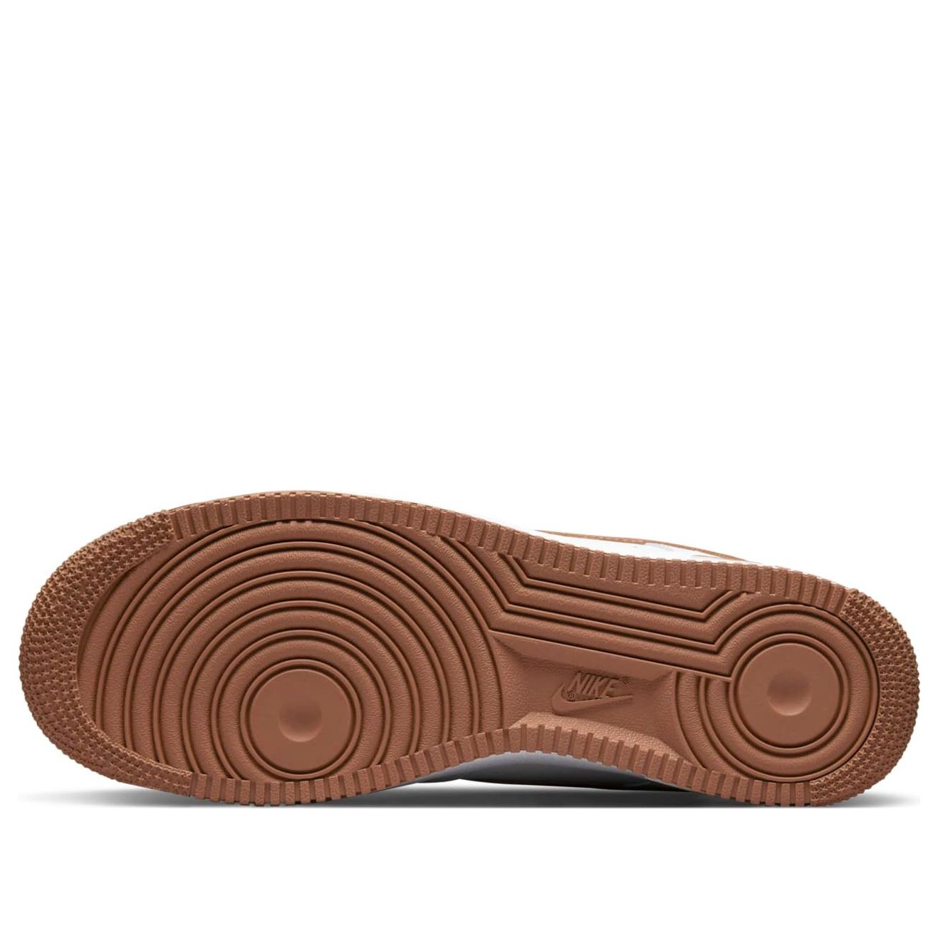 Close-up view of Nike Air Force 1 '07 'Pecan' sneakers showcasing white leather with chocolate-brown accents on the collar, Swoosh, heel, and tongue.