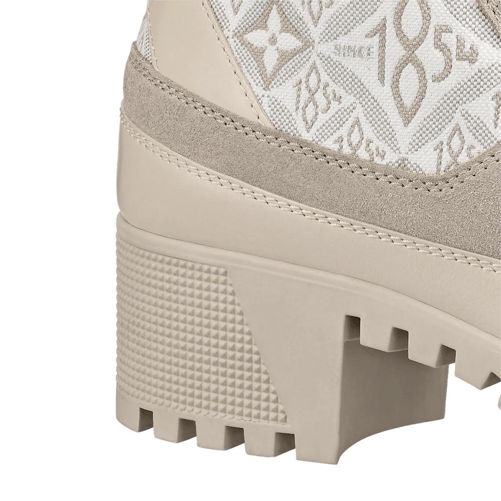Louis Vuitton Laureate Platform Desert Boots showcasing vintage-inspired Since 1854 jacquard textile with suede calf leather trim.
