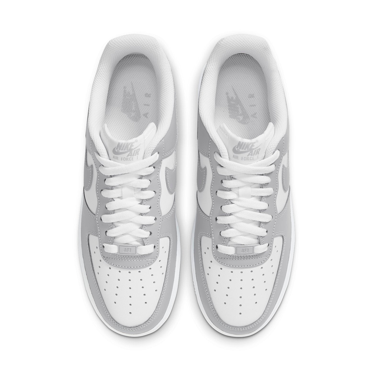 Air Force 1 07 'Light Smoke Grey White' on a sneaker shelf, perfect for sneakerheads.