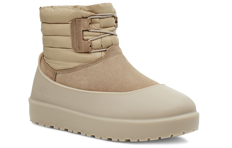 Side profile of UGG Classic Mini Lace-Up Weather Boot 'Dune' highlighting its versatile color and trendy style.