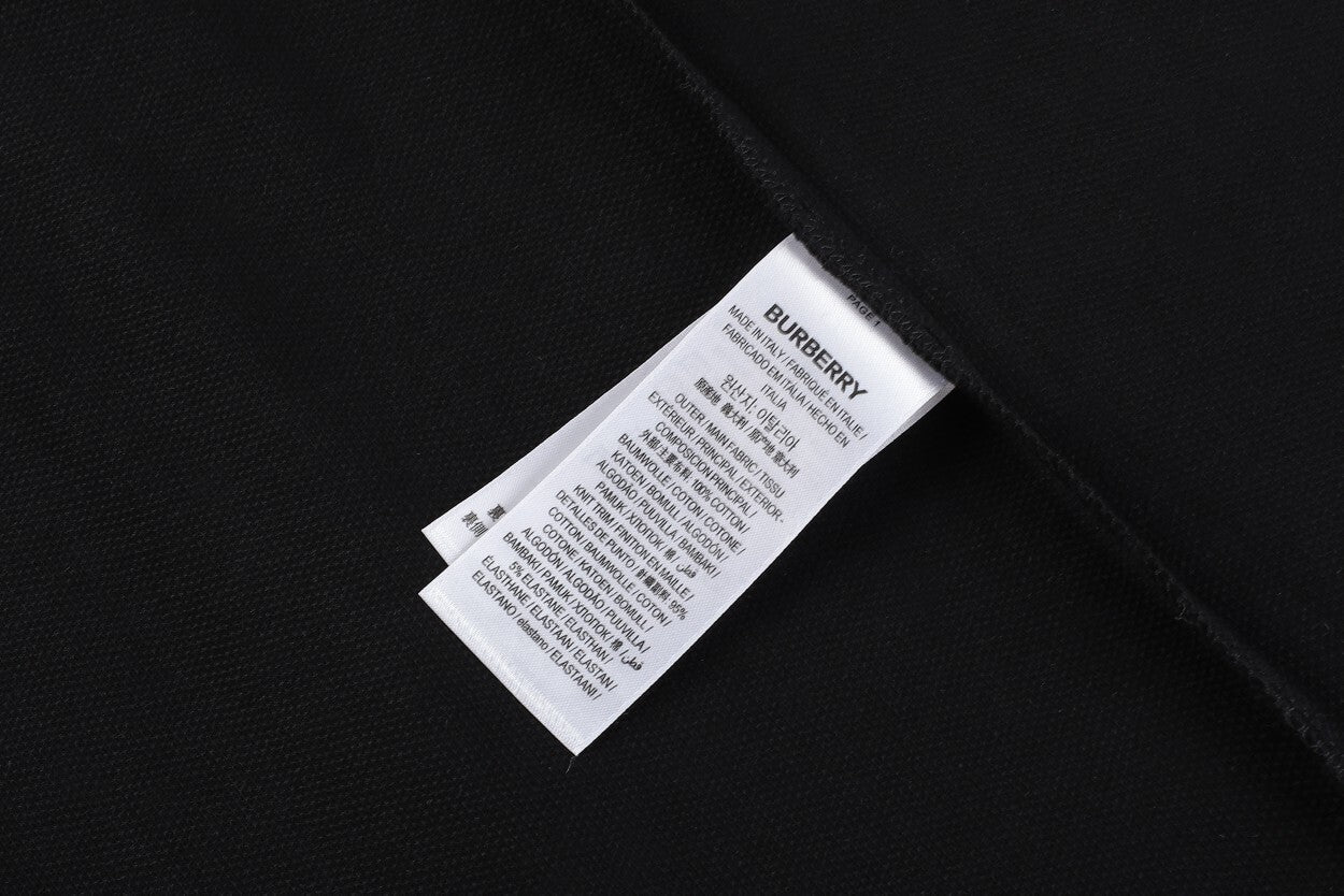 Close-up view of Burberry Check Collar Polo Shirt, highlighting the premium cotton material and tailored fit.