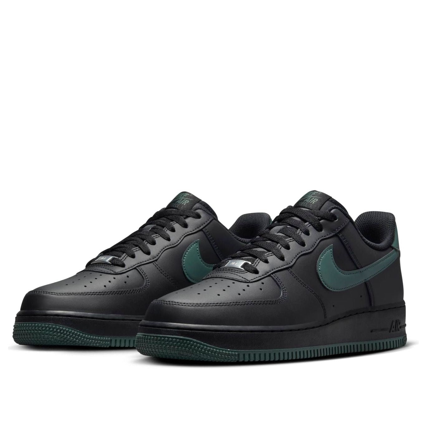 Close-up of the Nike Air Force 1 Low 'Black Vintage Green' highlighting the smooth black midsole and contrasting vintage green features.