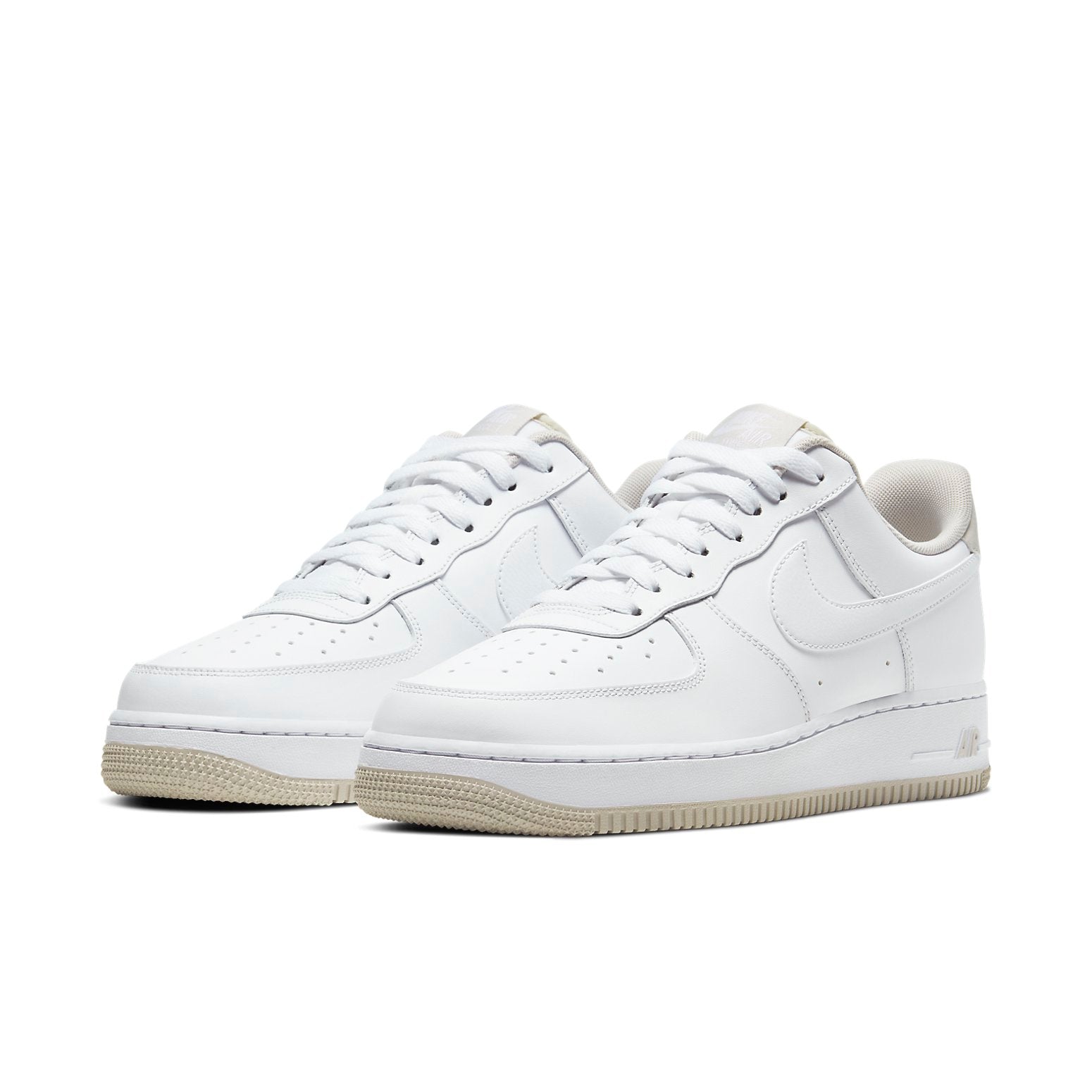 Nike Air Force 1 Low 'White Light Bone' angled side profile highlighting the padded nylon tongue and white mesh sock liner.