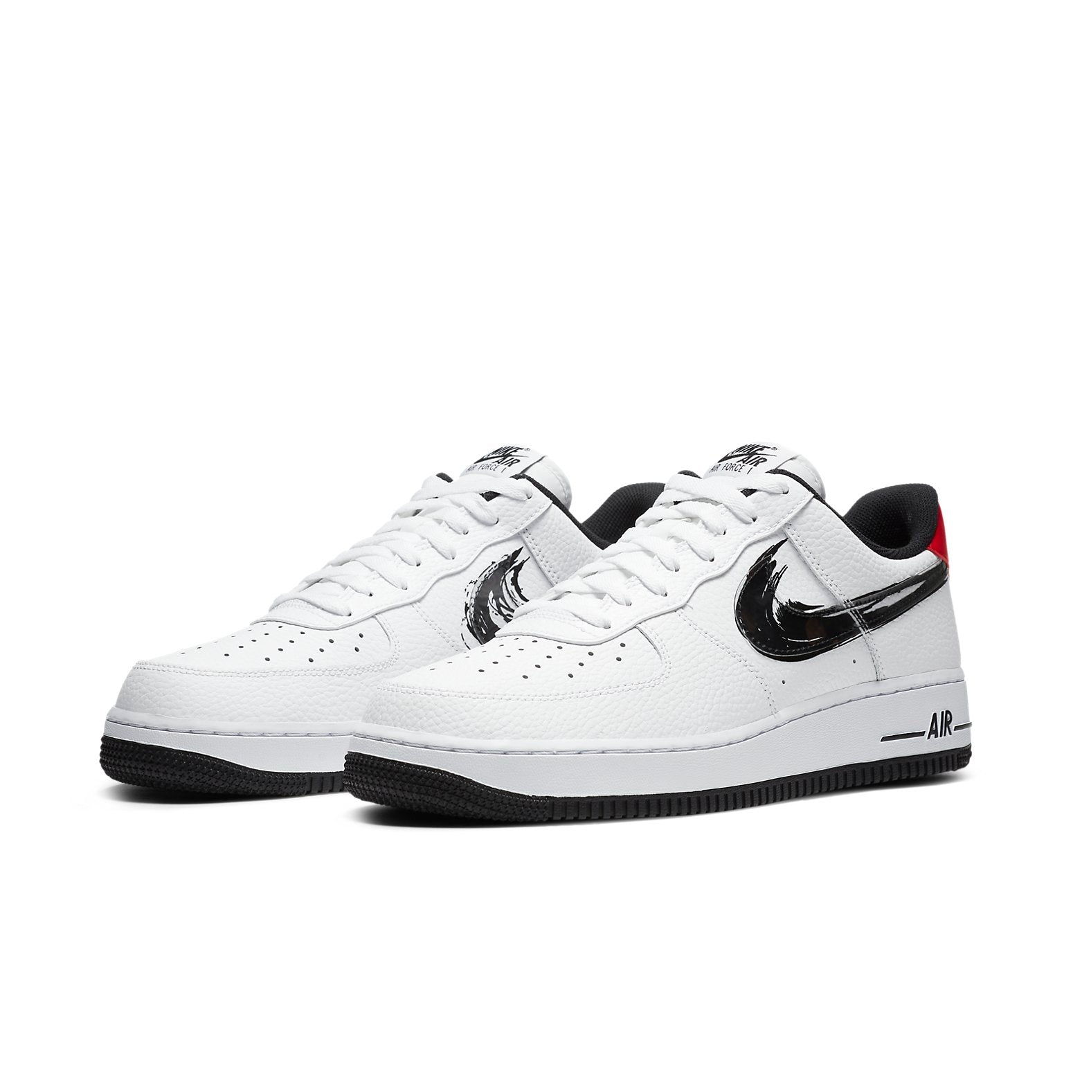 Nike Air Force 1 Low 'Brushstroke - White' on feet, styled with casual wear, emphasizing the sneaker's versatility.