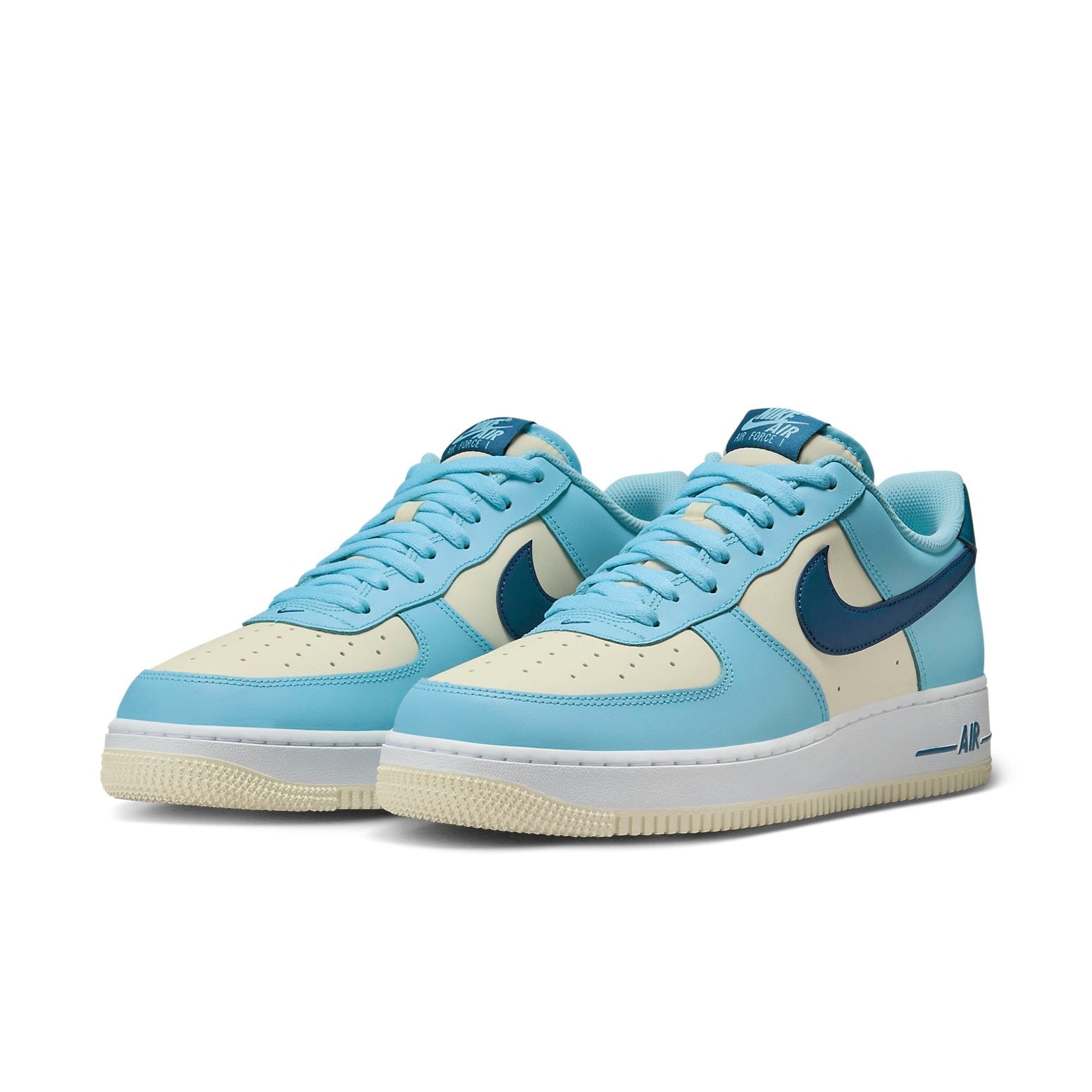 Close-up of the Nike Air Force 1 Low 'Coconut Milk Aquarius Blue' showing the iconic Swoosh and unique color details.
