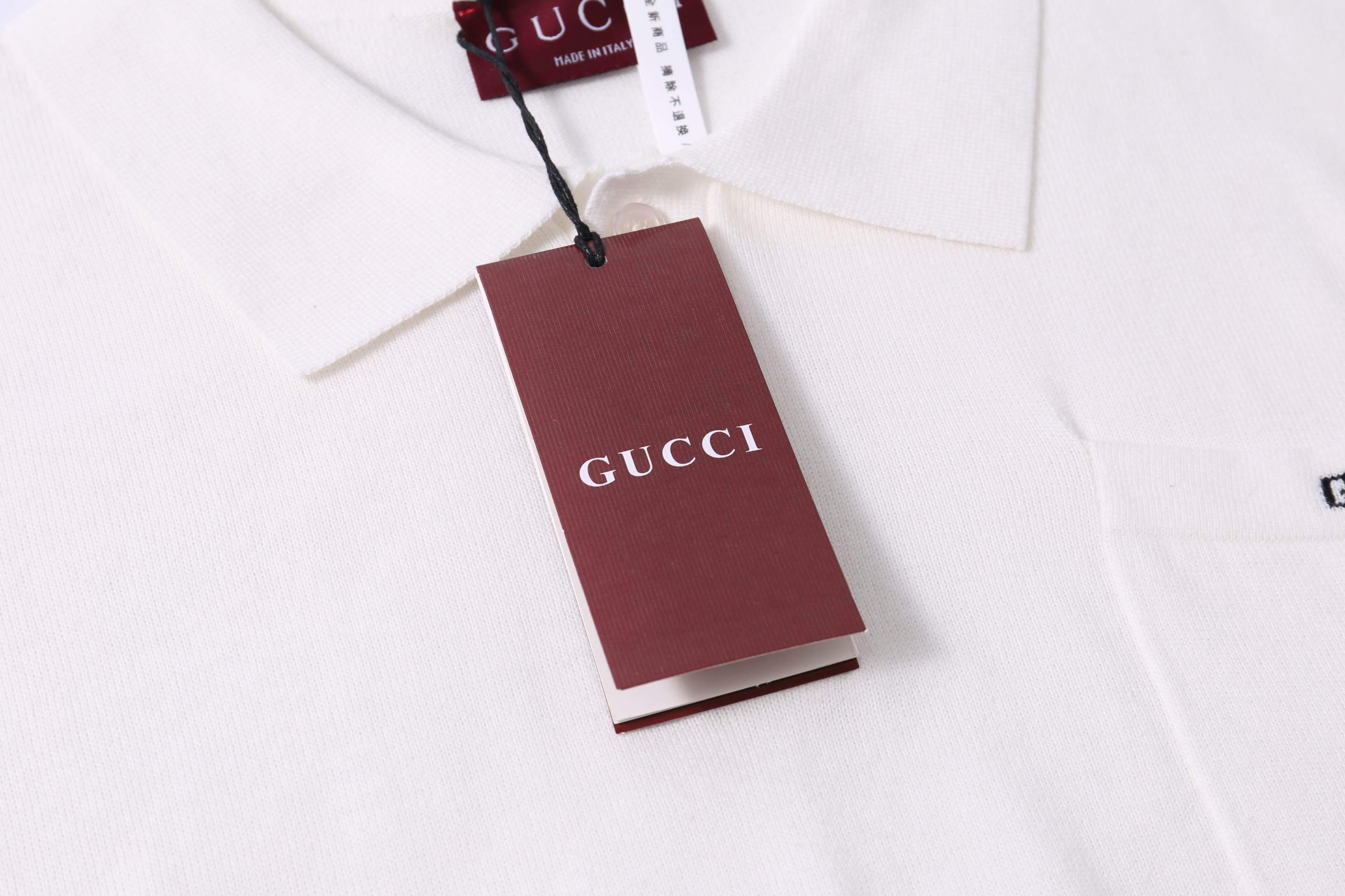 Model wearing a Gucci T-shirt with a collar, styled with jeans, highlighting the casual luxury look.