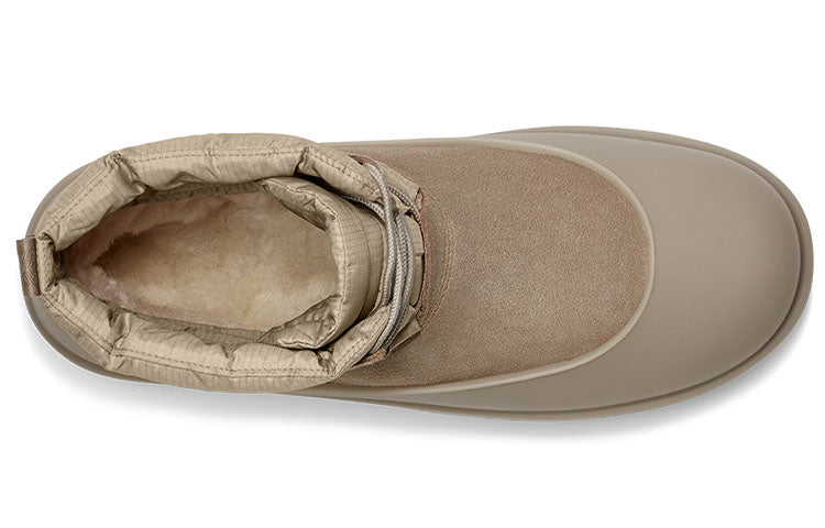 UGG Classic Mini Lace-Up Weather Boot 'Dune' featuring stylish lace-up design and plush sheepskin lining, perfect for winter outfits.
