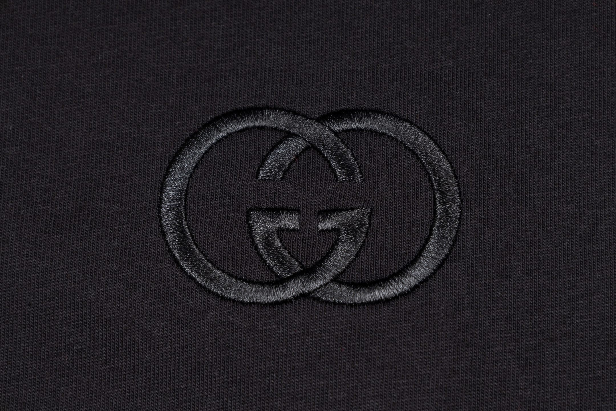 Close-up of the Gucci T-Shirt Without Collar 'Black' highlighting the relaxed fit and premium quality.