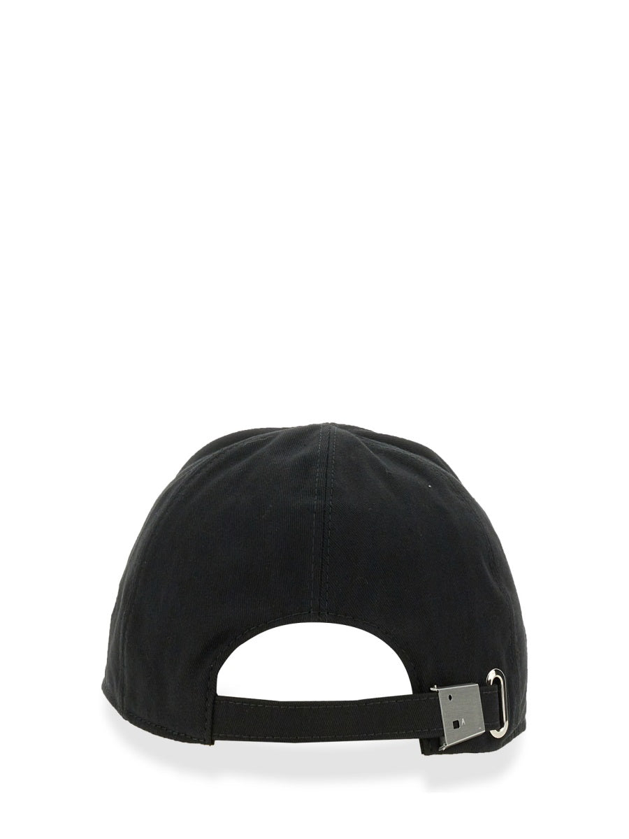 Back view of black adjustable strapback cap with metal buckle on white background
