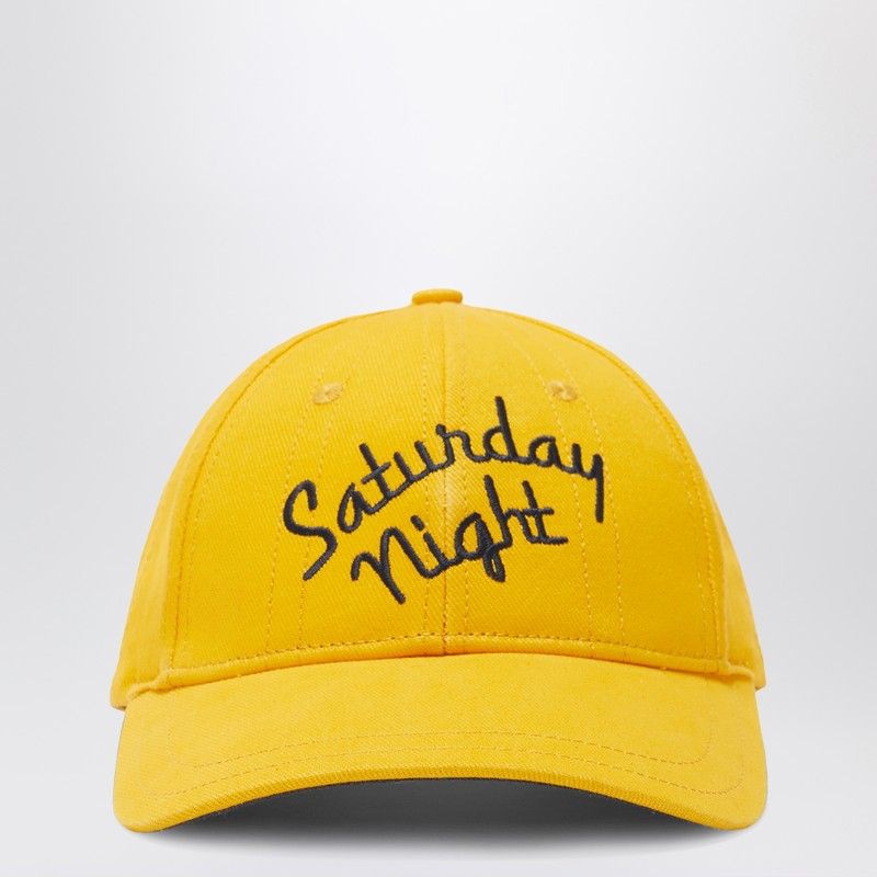 Yellow baseball cap with black 'Saturday Night' embroidered text on front