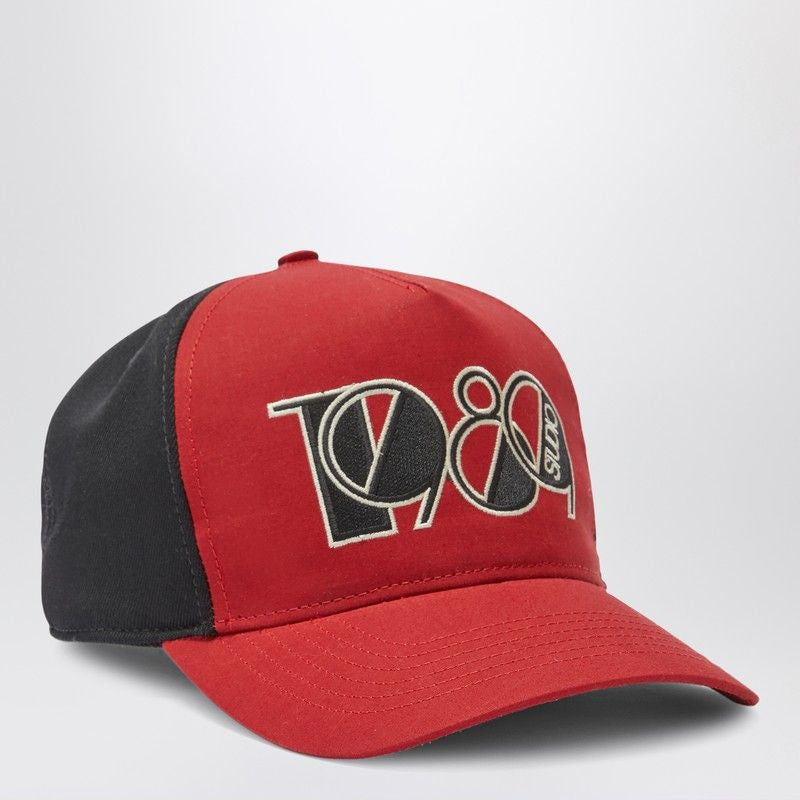 Red and black baseball cap with bold 1989 embroidery on the front panel
