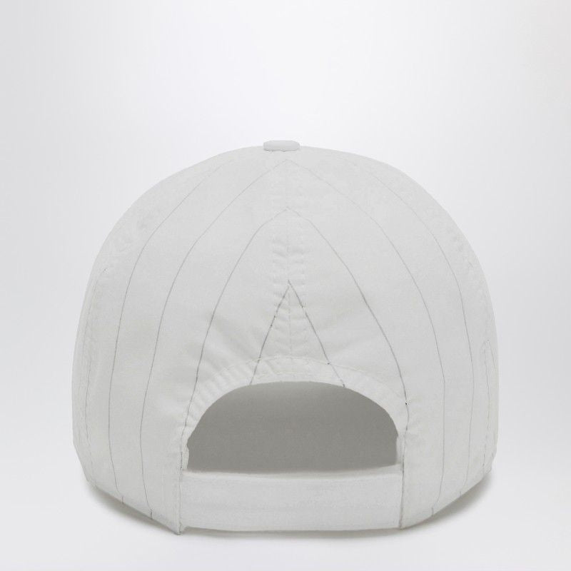 Back view of a white adjustable baseball cap with subtle stitching details