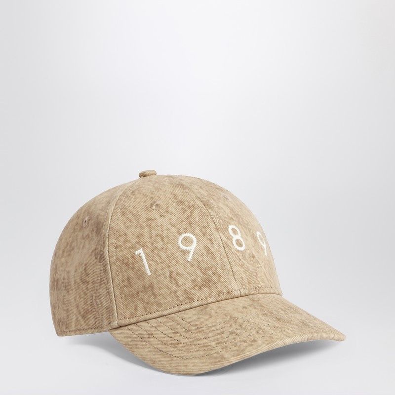 Beige baseball cap with white embroidered 1989 text on front, fashion accessory