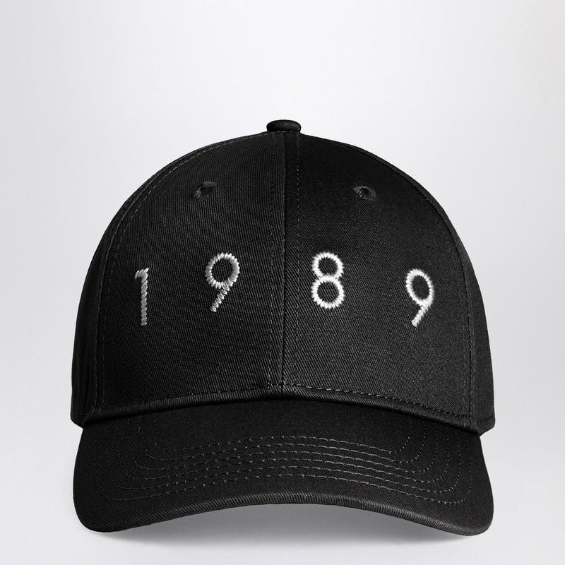 Black baseball cap with 1989 white embroidered numbers on front, fashion accessory