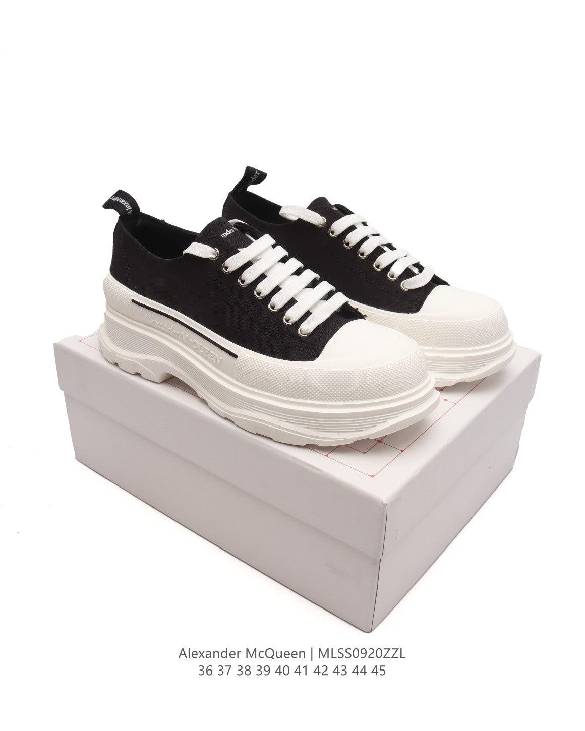 Alexander McQueen Women Tread Slick lace-up Sneakers 'Black/White' - Banlieue91