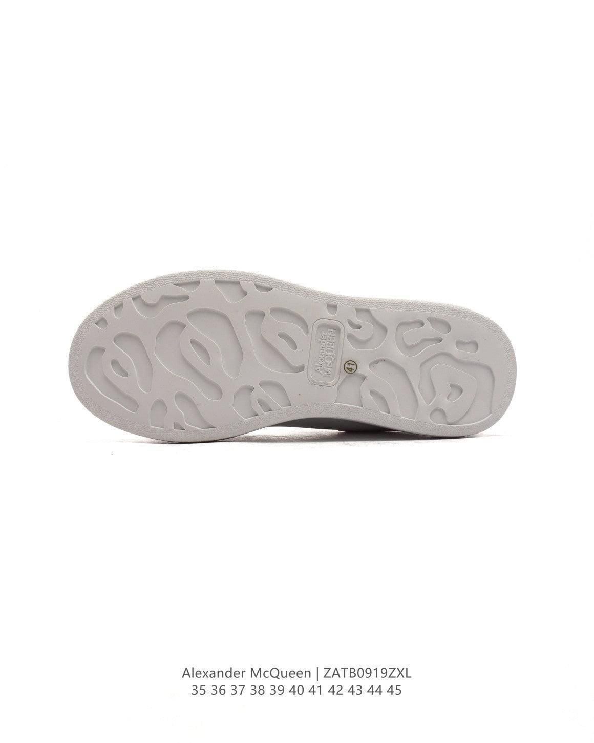Alexander McQueen Sneakers White & Red | Luxury Fashion Statement | Banlieue91